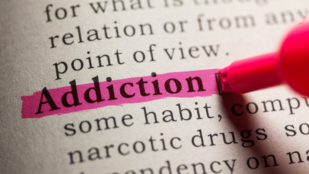 addiction marked in a dictionary