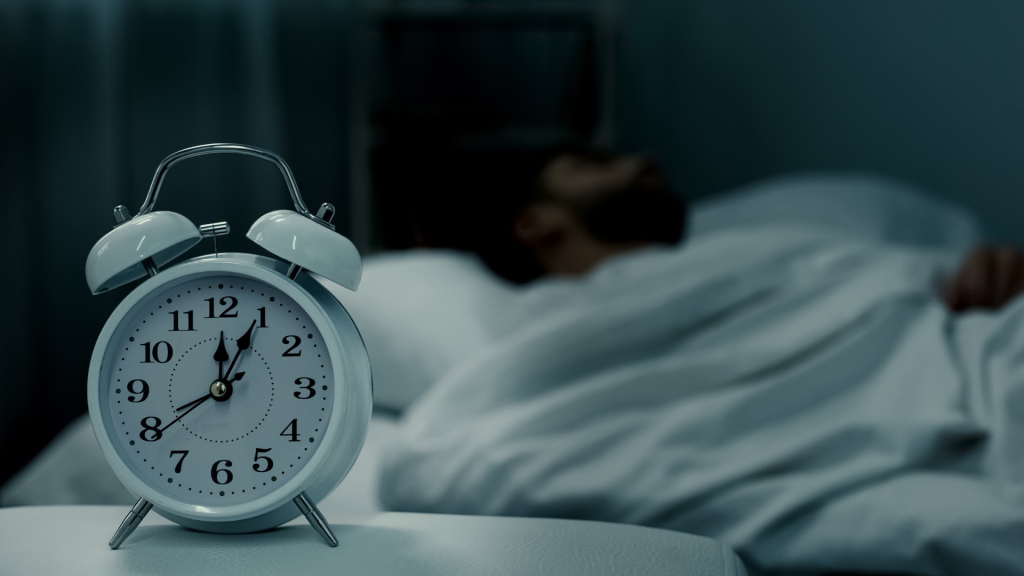 clock and sleeping man