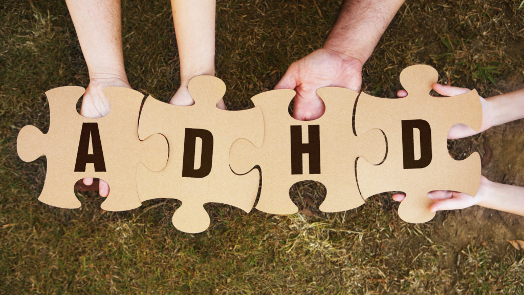 hands holding ADHD sign