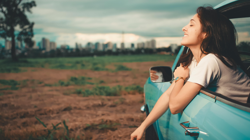 woman tripping on shrooms in a car