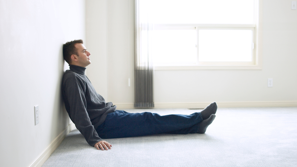 man sitting on the floor